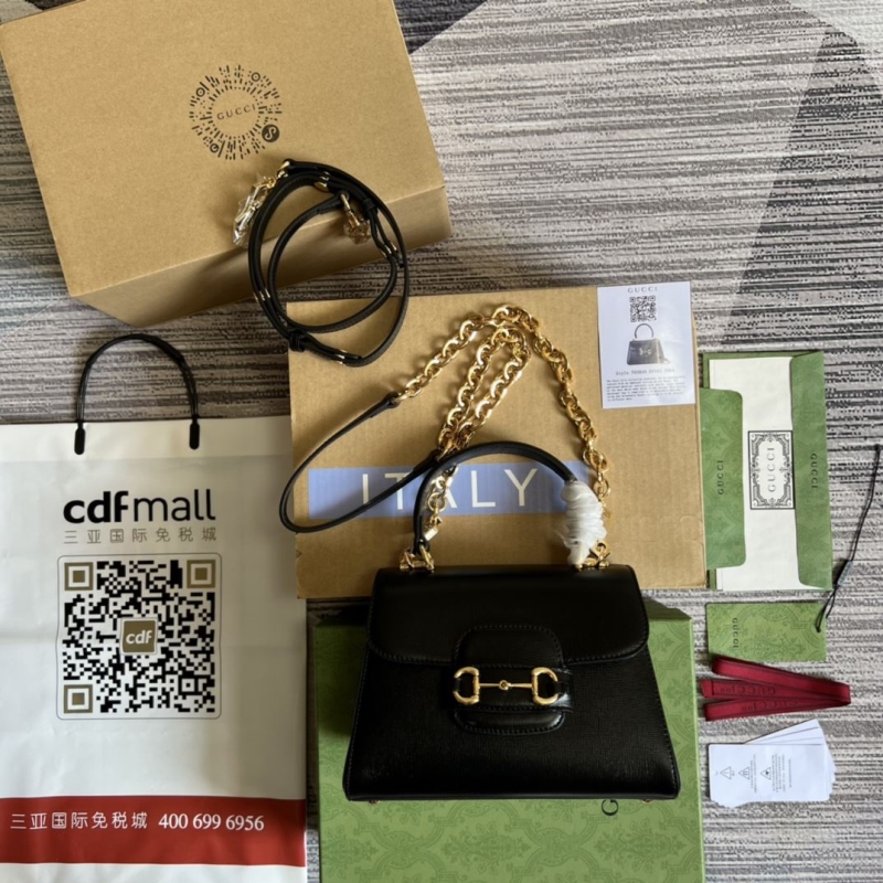 G*u*i top handle bags